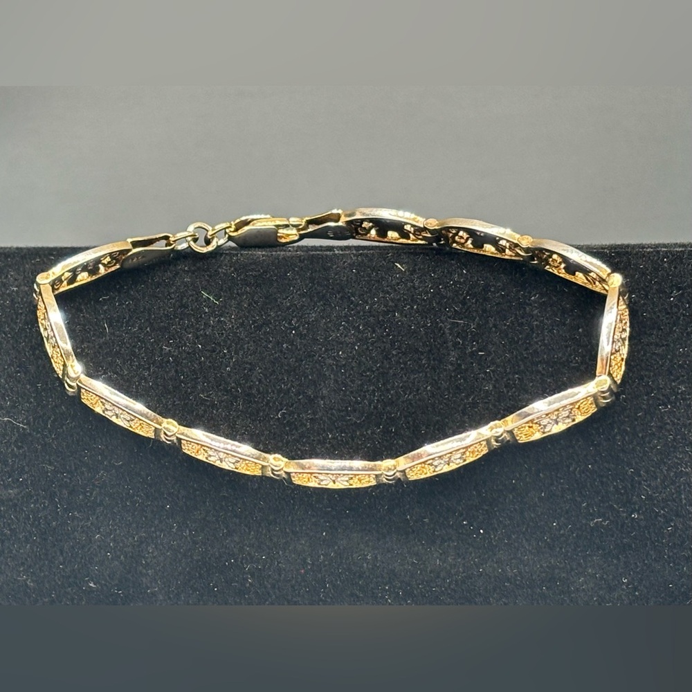 Elegant Gold tone and Sterling Silver Bracelet